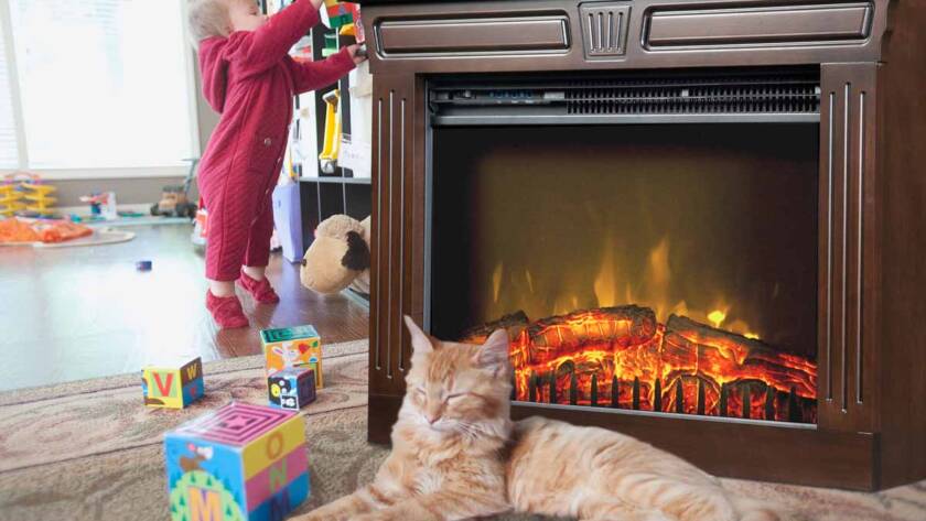 Cat resting near an Amish Fireplace with a toddler playing in the background