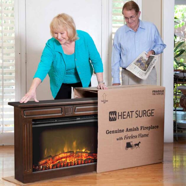 Couple opening an Amish Fireplace in their home