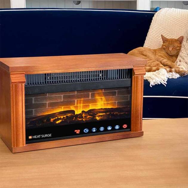 A cat sleeping on a couch with a Multi-Color Mini Glo Widescreen on the table in front