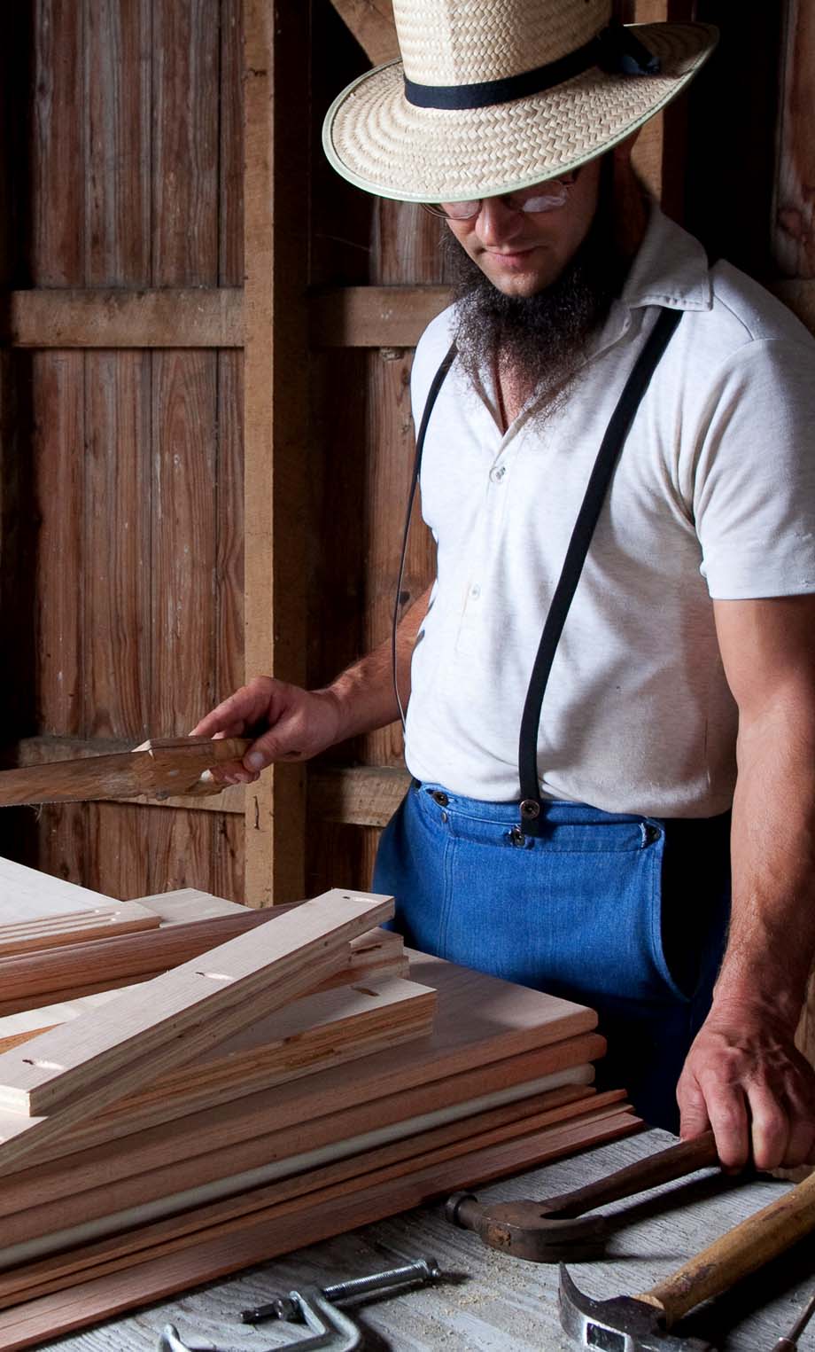 Amish craftsman gathering his tools